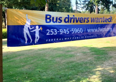 A simple banner on a busy street can be very effective.