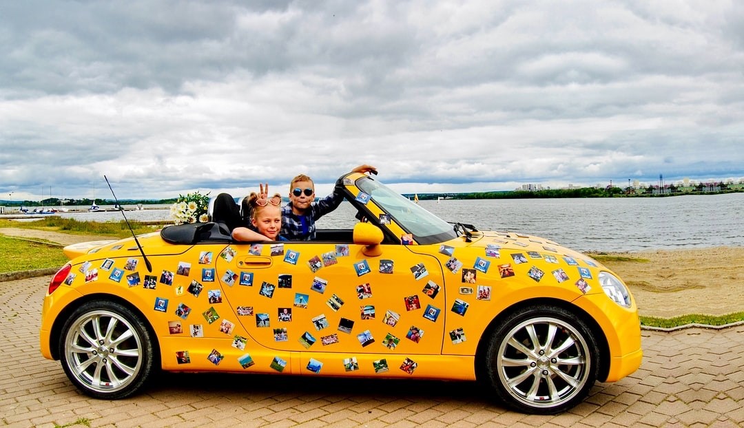 Yellow Slug Bug with Magnets All Over Car Body